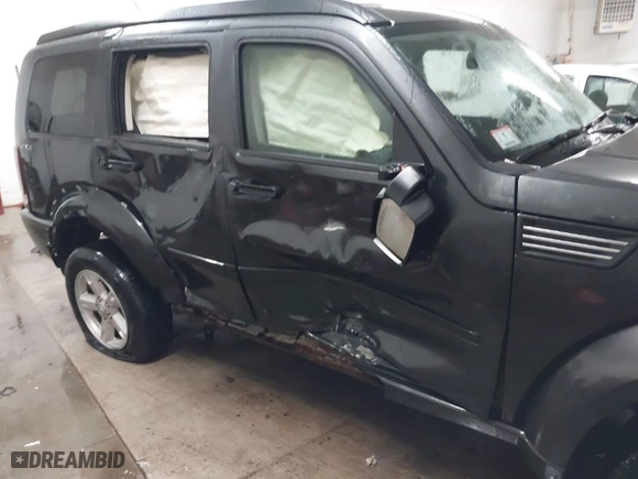 2010 Dodge Nitro SXT with VIN 1D4PU5GK0AW126478, listed as a IAAI auction lot 41362674 with 171,704 mi miles. Bid and sale history available at carsss.com. Image 6.