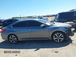 2016 Nissan Altima SR with VIN 1N4AL3AP1GC285363, listed as a IAAI auction lot 41754598 with 121,923 mi miles and . Bid and sale history available at carsss.com. Image 13.