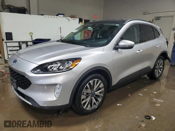 2020 Ford Escape Titanium Hybrid z VIN 1FMCU9DZ6LUB39475, wystawiony jako Copart lot #50159215 z przebiegiem 76 496 mil mil oraz Szkoda całkowita • Salvage title. Historia ofert i sprzedaży dostępna na DreamBid. Obrazek 1.