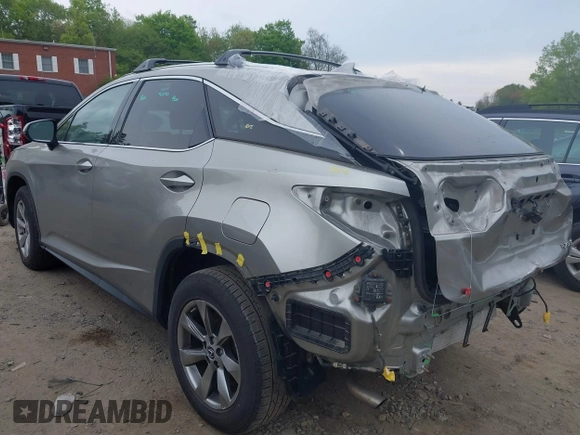 2018 Lexus RX 350 z VIN 2T2BZMCA4JC157690, wystawiony jako IAAI lot #42155397 z przebiegiem 104 075 mil mil oraz . Historia ofert i sprzedaży dostępna na DreamBid. Obrazek 3.
