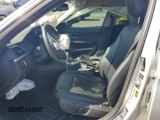 2014 BMW 3 Series 335i xDrive with VIN WBA3B9G57ENR91797, listed as a Copart auction lot 53724325 with 164,279 mi miles and Salvage Title. Bid and sale history available at DreamBid. Image 7.