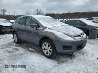 2009 Mazda CX-7 Grand Touring z VIN JM3ER29L990221136, wystawiony jako Copart lot #45233915 z przebiegiem 156 676 mil mil oraz Czysty tytuł • Clean title. Historia ofert i sprzedaży dostępna na DreamBid. Obrazek 4.
