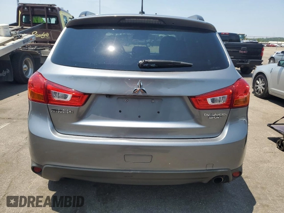 2015 Mitsubishi Outlander SE with VIN 4A4AR4AU2FE011699, listed as a Copart auction lot 60509945 with 141,192 mi miles and Salvage title. Bid and sale history available at DreamBid. Image 6.