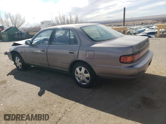 1994 Toyota Camry LE z VIN JT2GK12E2R0050878, wystawiony jako Copart lot #46878005 z przebiegiem 152 211 mil mil oraz Szkoda całkowita • Salvage title. Historia ofert i sprzedaży dostępna na DreamBid. Obrazek 2.