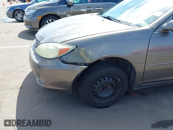 2004 Toyota Camry LE with VIN 4T1BE32K44U825561, listed as a IAAI auction lot 42051914 with 244,521 mi miles and . Bid and sale history available at DreamBid. Image 5.