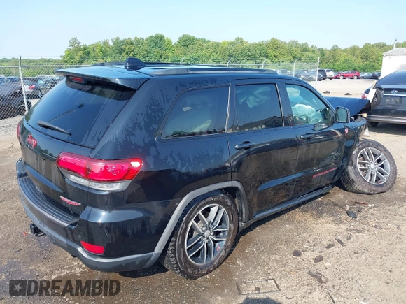 2018 Jeep Grand Cherokee Trailhawk with VIN 1C4RJFLG4JC241057, listed as a IAAI auction lot 42416590 with 81,822 mi miles and . Bid and sale history available at DreamBid. Image 4.