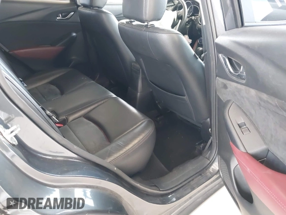 2017 Mazda CX-3 Grand Touring z VIN JM1DKFD70H0150496, wystawiony jako IAAI lot #41746038 z przebiegiem 108 091 mil mil oraz . Historia ofert i sprzedaży dostępna na DreamBid. Obrazek 8.