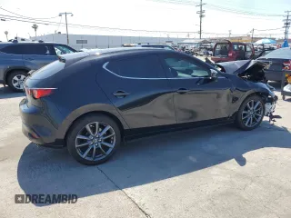 2024 Mazda 3 S Preferred z VIN JM1BPALM2R1721467, wystawiony jako Copart lot #54948775 z przebiegiem Nie podano mil oraz Szkoda całkowita • Salvage title. Historia ofert i sprzedaży dostępna na DreamBid. Obrazek 3.