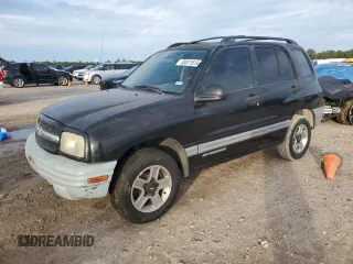 2002 Chevrolet Tracker z VIN 2CNBE13CX26900951, wystawiony jako Copart lot #83871514 z przebiegiem 122 718 mil mil oraz Szkoda całkowita • Salvage title. Historia ofert i sprzedaży dostępna na DreamBid. Obrazek 1.