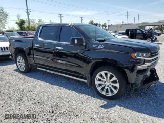 2021 Chevrolet Silverado 1500 High Country with VIN 3GCPWFED2MG329912, listed as a Copart auction lot 47391595 with 122,599 mi miles and Clean Title. Bid and sale history available at carsss.com. Image 4.