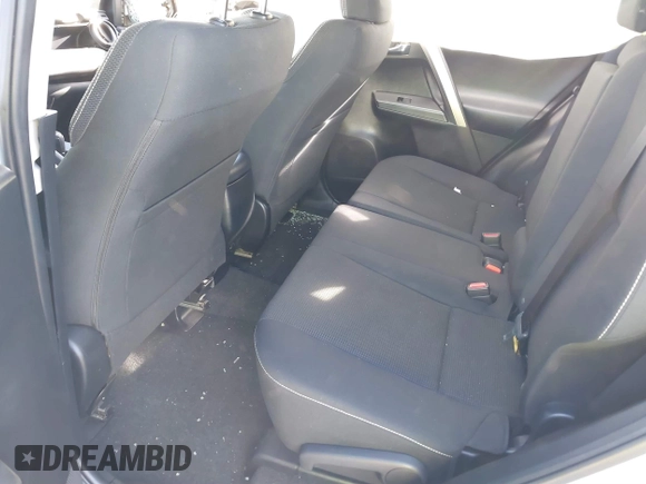 2018 Toyota RAV4 XLE with VIN JTMWFREV8JJ157496, listed as a IAAI auction lot 42249948 with 64,767 mi miles and . Bid and sale history available at DreamBid. Image 8.