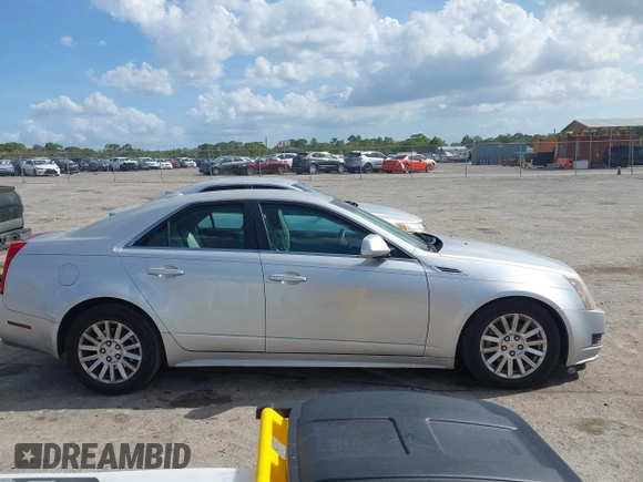 2010 Cadillac CTS with VIN 1G6DA5EG9A0128758, listed as a IAAI auction lot 41958677 with 156,088 mi miles and . Bid and sale history available at DreamBid. Image 13.