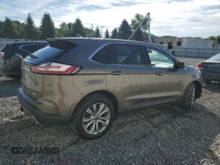2019 Ford Edge Titanium with VIN 2FMPK4K99KBC31259, listed as a Copart auction lot 63067555 with 86,629 mi miles and Salvage title. Bid and sale history available at DreamBid. Image 3.