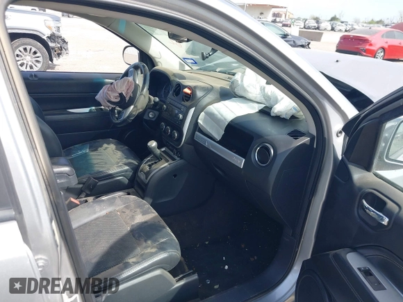 2016 Jeep Compass Latitude with VIN 1C4NJCEA7GD675742, listed as a IAAI auction lot 41877787 with 107,749 mi miles and . Bid and sale history available at DreamBid. Image 5.