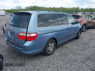 2007 Honda Odyssey EX z VIN 5FNRL38467B087065, wystawiony jako IAAI lot #42204370 z przebiegiem 242 844 mil mil oraz . Historia ofert i sprzedaży dostępna na DreamBid. Obrazek 4.