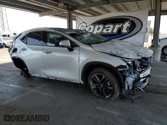 2025 Lexus NX 450h+ Luxury z VIN JTJHKCFZ2S2044283, wystawiony jako Copart lot #59584865 z przebiegiem 3 562 mil mil oraz Szkoda całkowita • Salvage title. Historia ofert i sprzedaży dostępna na DreamBid. Obrazek 4.