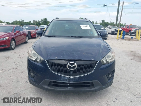 2014 Mazda CX-5 Grand Touring with VIN JM3KE2DY8E0425258, listed as a IAAI auction lot 42179452 with 132,137 mi miles. Bid and sale history available at carsss.com. Image 12.