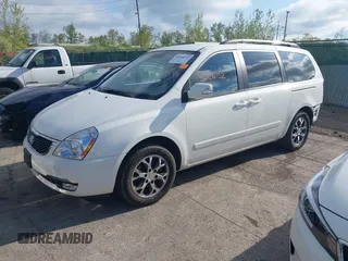 2014 Kia Sedona LX with VIN KNDMG4C75E6545483, listed as a IAAI auction lot 42166152 with 121,827 mi miles and . Bid and sale history available at carsss.com. Image 2.