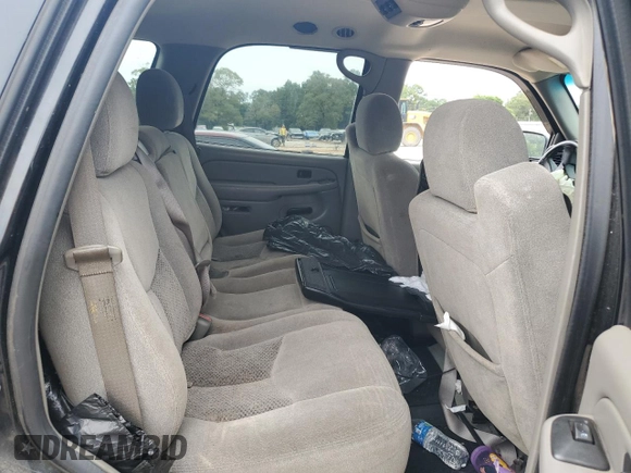 2004 Chevrolet Tahoe LS z VIN 1GNEC13V04R319403, wystawiony jako Copart lot #60996875 z przebiegiem 266 466 mil mil oraz Szkoda całkowita • Salvage title. Historia ofert i sprzedaży dostępna na DreamBid. Obrazek 11.
