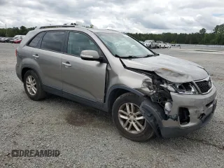 2015 Kia Sorento LX with VIN 5XYKTCA68FG651349, listed as a Copart auction lot 58441095 with 218,027 mi miles and Salvage title. Bid and sale history available at DreamBid. Image 4.