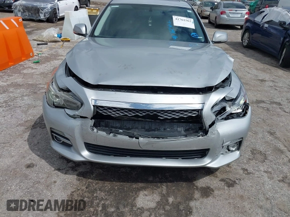 2014 Infiniti Q50 Premium z VIN JN1BV7AP9EM690381, wystawiony jako IAAI lot #41761562 z przebiegiem 107 099 mil mil oraz . Historia ofert i sprzedaży dostępna na DreamBid. Obrazek 6.