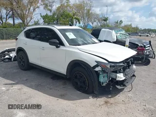 2021 Mazda CX-5 Signature with VIN JM3KFBEY0M0436264, listed as a IAAI auction lot 41568892 with 36,833 mi miles. Bid and sale history available at carsss.com. Image 1.