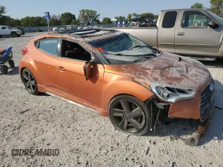 2015 Hyundai Veloster Turbo z VIN KMHTC6AE4FU232597, wystawiony jako Copart lot #74137024 z przebiegiem Nie podano mil oraz Szkoda całkowita • Salvage title. Historia ofert i sprzedaży dostępna na DreamBid. Obrazek 4.