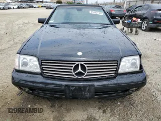 1998 Mercedes-Benz SL z VIN WDBFA76F6WF165874, wystawiony jako Copart lot #53392195 z przebiegiem 141 126 mil mil oraz Tytuł czysty. Historia ofert i sprzedaży dostępna na DreamBid. Obrazek 5.