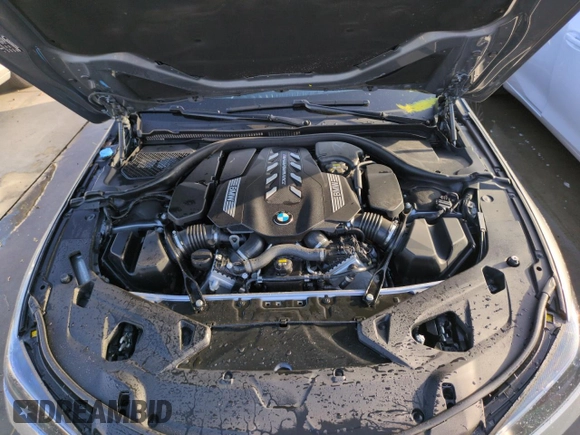 2023 BMW 8 Series M850i z VIN WBAGV8C02PCL20503, wystawiony jako Copart lot #74098614 z przebiegiem Nie podano mil oraz Szkoda całkowita • Salvage title. Historia ofert i sprzedaży dostępna na DreamBid. Obrazek 11.