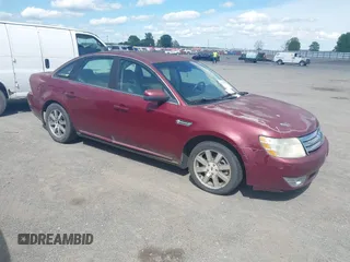 2008 Ford Taurus SEL z VIN 1FAHP24W68G132701, wystawiony jako IAAI lot #41928871 z przebiegiem 385 163 mil mil oraz . Historia ofert i sprzedaży dostępna na DreamBid. Obrazek 1.