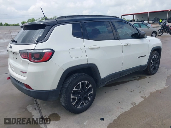2020 Jeep Compass Trailhawk with VIN 3C4NJDDB3LT118928, listed as a IAAI auction lot 42128120 with 95,477 mi miles and . Bid and sale history available at DreamBid. Image 4.