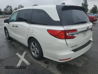 2018 Honda Odyssey EX-L with VIN 5FNRL6H77JB008571, listed as a Copart auction lot 46948585 with 88,699 mi miles and Salvage Title. Bid and sale history available at carsss.com. Image 2.