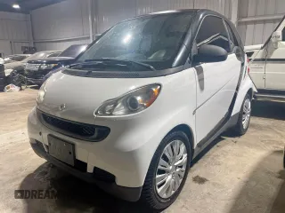 2012 Smart fortwo Pure z VIN WMEEJ3BA5CK540092, wystawiony jako Copart lot #57123825 z przebiegiem 59 356 mil mil oraz Szkody całkowita. Historia ofert i sprzedaży dostępna na DreamBid. Obrazek 2.