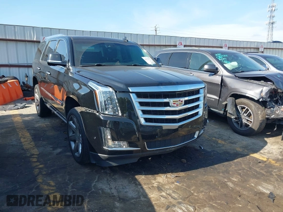 2017 Cadillac Escalade Premium Luxury with VIN 1GYS3CKJ2HR121993, listed as a IAAI auction lot 42172777 with 157,494 mi miles and . Bid and sale history available at DreamBid. Image 1.