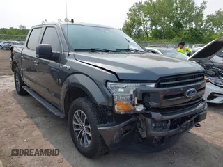 2020 Ford F-150 XL with VIN 1FTEW1EP1LFC21317, listed as a IAAI auction lot 42391410 with 77,999 mi miles and . Bid and sale history available at DreamBid. Image 1.