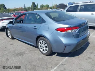 2024 Toyota Corolla Hybrid LE with VIN JTDBCMFE5RJ030239, listed as a IAAI auction lot 40489207 with 5,295 mi miles. Bid and sale history available at carsss.com. Image 3.