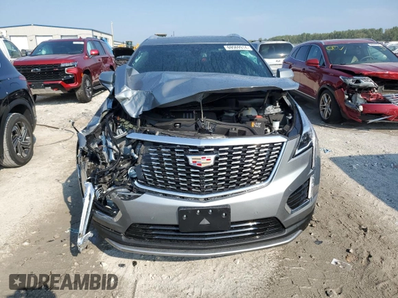 2023 Cadillac XT5 AWD Premium Luxury with VIN 1GYKNDR40PZ152982, listed as a Copart auction lot 69569914 with 24,829 mi miles and Salvage Title. Bid and sale history available at DreamBid. Image 5.