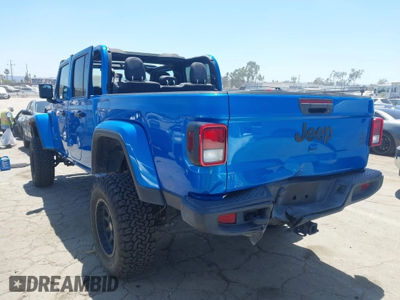 2022 Jeep Gladiator Texas Trail with VIN 1C6HJTAG4NL135346, listed as a IAAI auction lot 42824733 with 40,126 mi miles and . Bid and sale history available at DreamBid. Image 3.