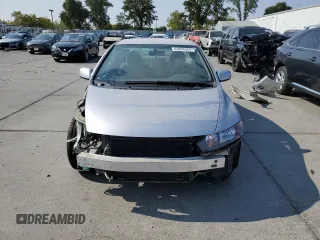 2010 Honda Civic Cpe LX with VIN 2HGFG1B6XAH523795, listed as a Copart auction lot 64898464 with 28,863 mi miles and Salvage Title. Bid and sale history available at carsss.com. Image 5.
