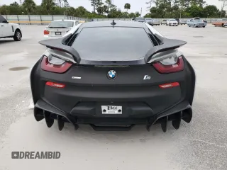 2015 BMW i8 z VIN WBY2Z2C56FV392042, wystawiony jako Copart lot #66972874 z przebiegiem Nie podano mil oraz Szkoda całkowita • Salvage title. Historia ofert i sprzedaży dostępna na DreamBid. Obrazek 6.