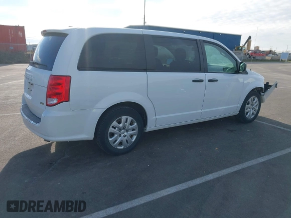 2019 Dodge Grand Caravan SE with VIN 2C4RDGBGXKR682747, listed as a IAAI auction lot 41840067 with 176,446 mi miles and . Bid and sale history available at DreamBid. Image 4.