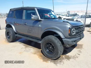 2021 Ford Bronco with VIN 1FMDE5BH7MLA99077, listed as a IAAI auction lot 42213383 with 79,740 mi miles and . Bid and sale history available at DreamBid. Image 1.
