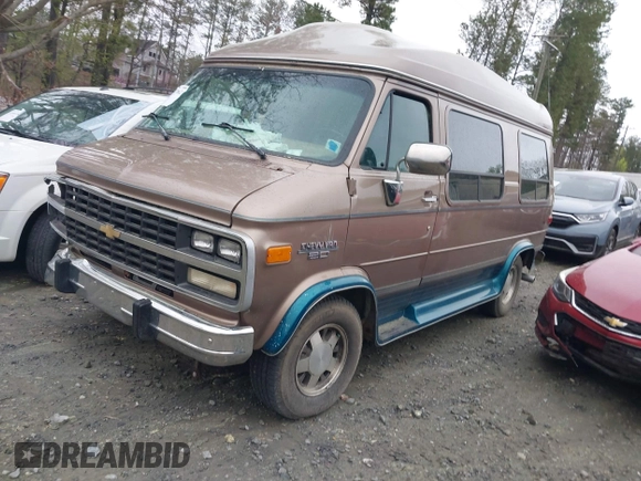 1995 Chevrolet Chevy Van z VIN 1GBEG25K8SF245639, wystawiony jako IAAI lot #41917862 z przebiegiem 89 015 mil mil oraz . Historia ofert i sprzedaży dostępna na DreamBid. Obrazek 17.