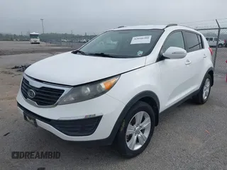 2011 Kia Sportage LX with VIN KNDPB3A24B7096901, listed as a IAAI auction lot 42090280 with 257,145 mi miles and . Bid and sale history available at carsss.com. Image 2.