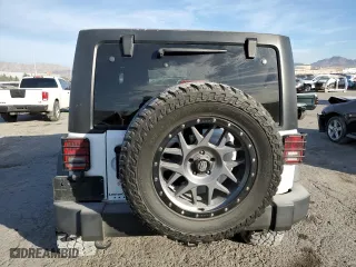 2012 Jeep Wrangler Unlimited Sport with VIN 1C4HJWDGXCL268227, listed as a Copart auction lot 86121234 with 137,585 mi miles and Salvage Title. Bid and sale history available at carsss.com. Image 6.