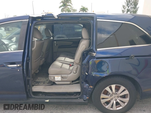 2016 Honda Odyssey EX-L with VIN 5FNRL5H60GB064815, listed as a IAAI auction lot 38644382 with 84,499 mi miles. Bid and sale history available at carsss.com. Image 6.