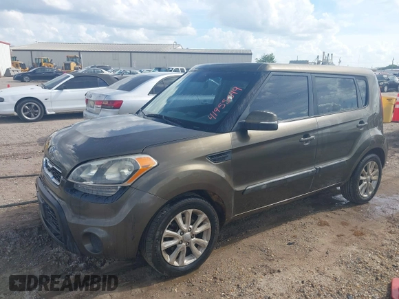 2012 Kia Soul + with VIN KNDJT2A67C7376281, listed as a IAAI auction lot 41955049 with 231,635 mi miles. Bid and sale history available at carsss.com. Image 2.