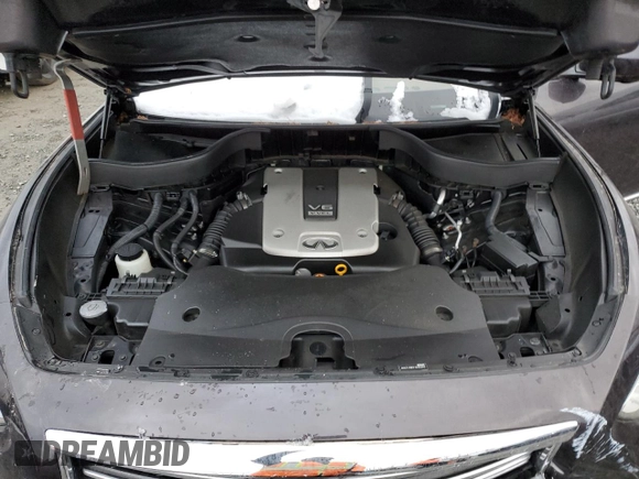 2015 Infiniti QX70 z VIN JN8CS1MW3FM480682, wystawiony jako Copart lot #44466285 z przebiegiem Nie podano mil oraz Szkoda całkowita • Salvage title. Historia ofert i sprzedaży dostępna na DreamBid. Obrazek 13.