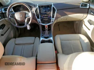 2016 Cadillac SRX Performance Collection with VIN 3GYFNCE37GS573748, listed as a Copart auction lot 66300135 with 136,619 mi miles and Salvage title. Bid and sale history available at DreamBid. Image 8.