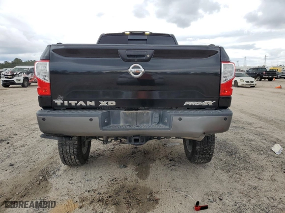 2017 Nissan Titan XD PRO-4X with VIN 1N6BA1F43HN555395, listed as a Copart auction lot 71322364 with 122,826 mi miles and Salvage Title. Bid and sale history available at carsss.com. Image 6.
